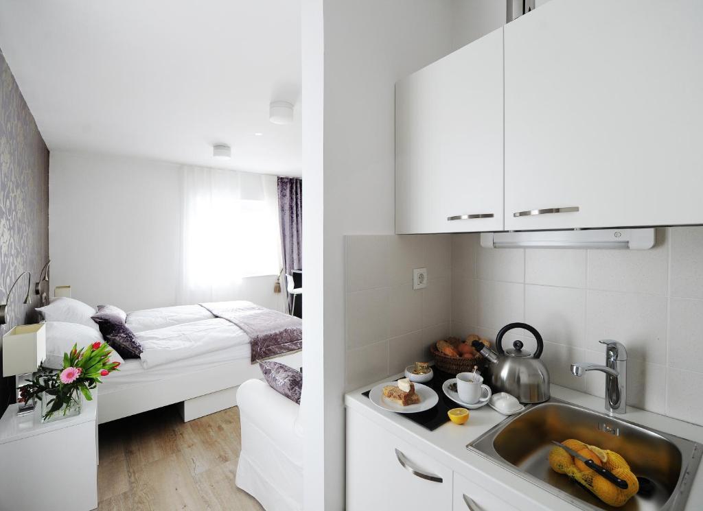 Garni Hotel Azur Ljubljana Værelse billede